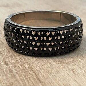 Silvertone Black Heart Perforated Hinged Bangle Bracelet